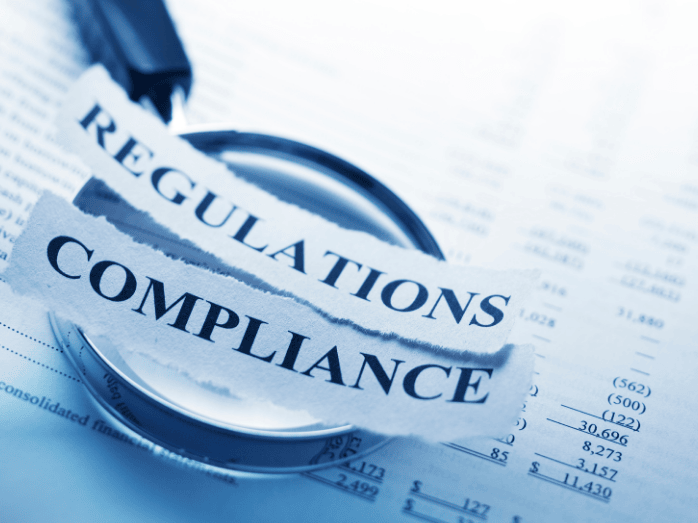 Green image of a hand placing the 